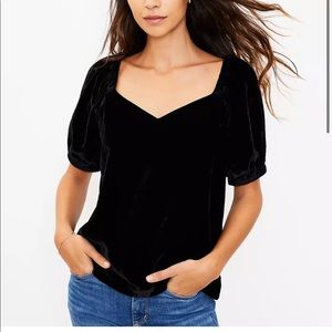 Velvet puff sleeve blouse.